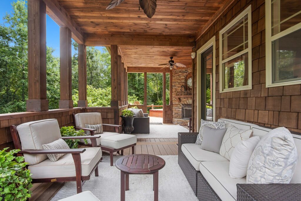Tranquil outdoor living with all weather decking, a wood burning fireplace, and an outdoor kitchen, complete with spa therapy.  